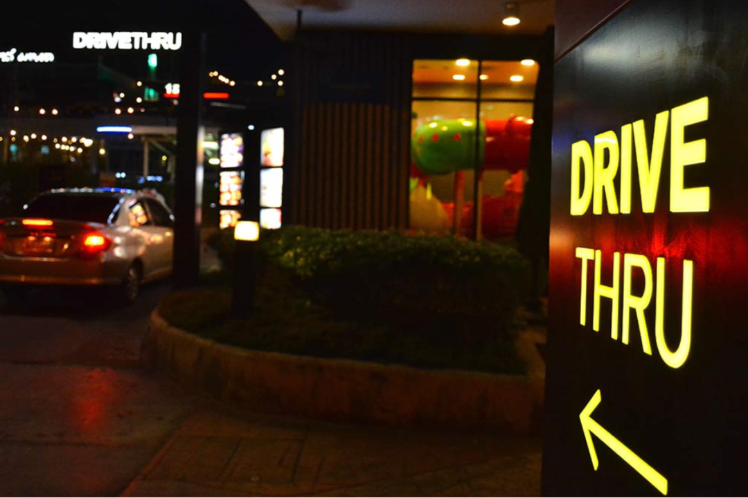 Drive thru sign at night