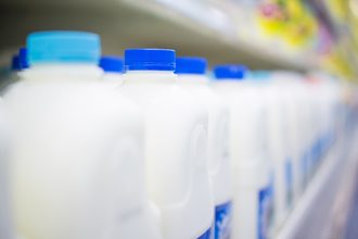 milk bottles milk pricing milk in dairy aisle milk in stock