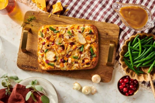 DiGiorno Thanksgiving Pizza new flavor product frozen cheese holiday  Detroit style crust topped with turkey, gravy diced sweet potatoes green beans cranberries mozzarella cheddar 